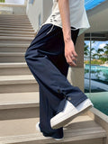 kkboxly  Chic Loose Fit Mopping Trousers, Men's Casual Solid Color Straight Leg Pants For Spring Summer