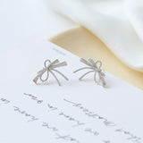 2025 Bow stud earrings femininity 2022 Japan and Korea trendy fashion super fairy earrings silver needle earrings manufacturers wholesale