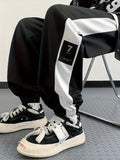 kkboxly  Chic Color Block Joggers, Men's Casual Stretch Waist Drawstring Sports Pants Sweatpants