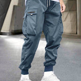 kkboxly Men's Stylish Letter Graphic Cargo Pants with Flap Pockets - Drawstring Waist for Comfort