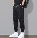 kkboxly  Men's Casual Cargo Pants, Regular Waist Drawstring Tapered Joggers For Outdoor Activities