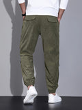 kkboxly  Men's Stylish Solid Corduroy Cargo Joggers With Pockets, Causal Breathable Drawstring Men's Bottom Clothing For City Walk Street Hanging Outdoor Activities