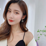 2025 Japanese and Korean earrings, a two-wear planet earring, temperament long five-pointed star earrings, simple tassel 925 silver needle.