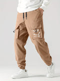kkboxly  Smile Print, Men's Drawstring Cargo Pants, Flap Pocket Loose Trendy Jogger Pants, Mens Work Pants