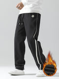 kkboxly  Men's Stripe Pattern Casual Tapered Trousers Solid Casual Long Cropped Drawstring Pants Streetwear For Men