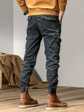 dunnmall  kkboxly  Trendy Solid  Cargo Cotton Blend Pants, Men's Multi Flap Pocket Trousers, Loose Casual Outdoor Pants, Men's Work Pants Outdoors Streetwear Hip Hop Style
