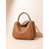 2025 Autumn and winter new niche design personalized minimalist shoulder bag versatile commuter underarm advanced sense messenger women's bag