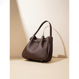 2025 Bags Large-capacity women's niche leather cowhide bucket bags Versatile Popular-style shoulder bags Premium casual messenger bags