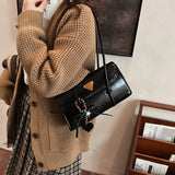 KKBOXLY 2025 Premium retro oil wax leather flip underarm bag women's popular new simple commuter large-capacity portable shoulder bag