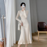 2025 Autumn and winter new medium and long knee-length sweater skirt with coat slim-fit base with fishtail knitted dress women