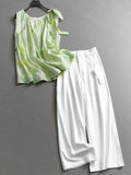 Smudge loose and thin, wrinkled streamer sleeveless shirt can be matched with a complete set of wide-leg pants women's suit X994.