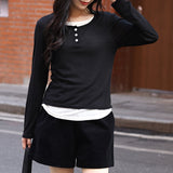 Niche design sense fake two long-sleeved T-shirt 25 spring new literary and artistic style contrasting colors inner round neck front shoulder top