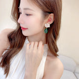 2025 Light luxury high-end earrings banquet dress bridal wedding dress with fairy wind translucent water droplets zircon flower earrings