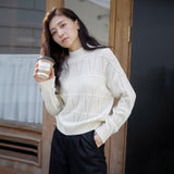 Hollow grid sweater women's spring and autumn new design sense solid color top threaded semi-turtleneck long-sleeved knitted sweater women