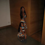 In the summer of , the new  New hot-selling contrasting color stripes, sexy slim-fitting backless neck jumpsuit