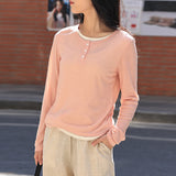Niche design sense fake two long-sleeved T-shirt 25 spring new literary and artistic style contrasting colors inner round neck front shoulder top