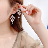 2025 Korean style heavy industry color zircon earrings women's copper inlaid zirconium fringed earrings silver needle personalized flower branch earrings