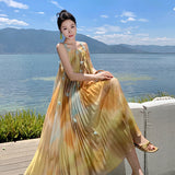 2025 Summer vacation style three-dimensional flower pleated smudged neck dress new loose meat covering and thin suspender dress