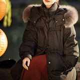 2025 Black bandage goose down jacket fox fur collar 90 white goose down jacket high-end Pinghu women's clothing new winter medium and long