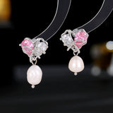 2025 S925 silver needle high-end earrings women's simple fashion sweet temperament love bow baroque pearl stud earrings