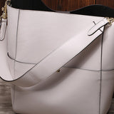 Factory spring and summer new women's bags, genuine leather, 2025 style cowhide bucket bags, shoulder portable shopping tide bags wholesale
