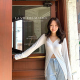spring new design V-neck long-sleeved women, thin temperament hem split-ended versatile casual knitted top