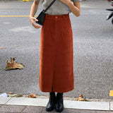 Corduroy skirt women's autumn and winter high waist hip skirt medium and long split one-step skirt strip velvet loose straight skirt