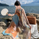 2025 smudge holiday style suspender skirt women's summer new flower organ pleated temperament lazy suspender dress