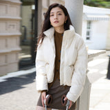 Solid color stand-up collar long-sleeved down jacket women's new winter design sense side pocket jacket thickened warm bread jacket