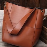 Factory spring and summer new women's bags, genuine leather, 2025 style cowhide bucket bags, shoulder portable shopping tide bags wholesale