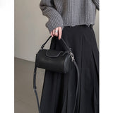 2025 popular autumn and winter new simple retro portable cylinder bag premium cowhide texture pillow bag single shoulder crossbody women's bag