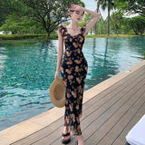 2025 Black Xiaofei sleeve suspender floral dress women's summer seaside vacation  romantic retro slim hip wrap dress