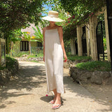 summer vacation wind suspender skirt women, pure cotton Korean ins backless lace-up design medium and long dress