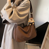 KKBOXLY 2025 Large capacity commuter tote bag women's popular new retro versatile underarm dumpling bag niche shoulder messenger bag