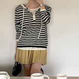 Hooded drawstring bottoming shirt women's spring new design versatile T-shirt V-neck shell buckle fake two-piece long-sleeved top