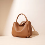 2025 Autumn and winter new niche design personalized minimalist shoulder bag versatile commuter underarm advanced sense messenger women's bag