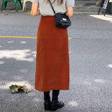 Corduroy skirt women's autumn and winter high waist hip skirt medium and long split one-step skirt strip velvet loose straight skirt