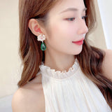 2025 Light luxury high-end earrings banquet dress bridal wedding dress with fairy wind translucent water droplets zircon flower earrings