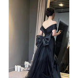 2025 Black dress skirt  new one-word shoulder  light luxury niche fishtail skirt haute couture satin dress