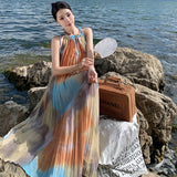 2025 smudge holiday style suspender skirt women's summer new flower organ pleated temperament lazy suspender dress