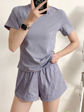 Thin running sports suit women's quick-drying and breathable loose fitness suit with pockets, summer new yoga suit D621