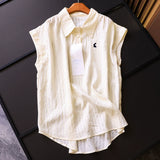 Solid color shoulder pinch pleated bunny embroidered lapel loose and thin summer new sleeveless versatile blouse X316