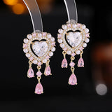 2025 S925 silver needle high-grade zircon inlaid pearl niche temperament earrings wholesale love-shaped water drop fringed earrings