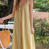 spring and summer new suspender dress v-neck design halter loose casual Korean version medium and long skirt