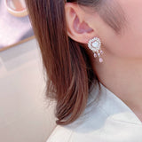 2025 S925 silver needle high-grade zircon inlaid pearl niche temperament earrings wholesale love-shaped water drop fringed earrings