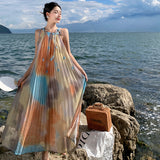 2025 smudge holiday style suspender skirt women's summer new flower organ pleated temperament lazy suspender dress