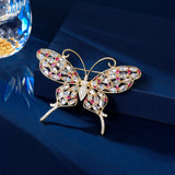 2025 Light luxury high-end autumn and winter coat accessories corsage bright full zirconium inlaid hollow niche design butterfly brooch wholesale