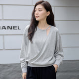 Niche design sense hollow cross top  spring women's fashion versatile round neck long sleeve pure cotton sweater