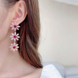 2025 Autumn and winter high-end earrings light luxury high-end bright zircon inlaid long multi-layer small daisy sun flower earrings