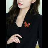 2025 High-end brooch wholesale multi-purpose fixed clothes bright orange zircon high-end autumn and winter coat accessories